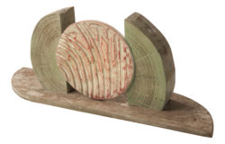 Stoneware medallion mounted on salvaged Cypress blocks. A great decorative addition to your home or office.