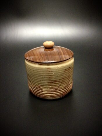 glazed mid fired ceramic jar with a turned walnut lid and a turned maple knob