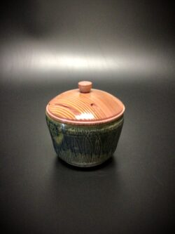 Glazed mid fired ceramic jar with an acrylic latex tinted Florida yellow pine lid and knob.